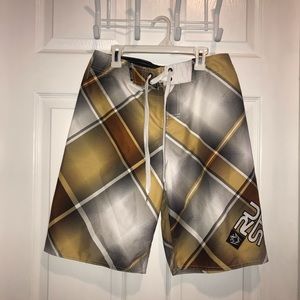 NWOT.  Rusty Size 20 Board Shorts Yellow